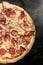 Meat lovers pizza, copy space background