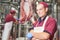 Meat manufacturing factory. Portrait of young butcher