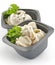 Meat pelmeni with sour cream and greens