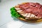 Meat plate set with salami, bacon, hamon