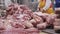 Meat processing at a meat factrory. Food industry. Fresh Raw Pork Chops in Meat Factory.