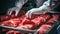 Meat processing or quality control process in the food industry environment.