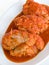 Meat roulade in tomato sauce.