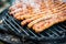 Meat sausages roasted on the grill