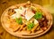Meat snack for group friends. Tasty delicious snacks. Restaurant food. Snack for beer. Wooden board french fries fish