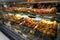 Meat snacks, sandwiches on display in an Italian store or bar