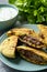 Meat stuffed pita bread and tzatziki dip.