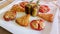 Meat and vegetable snacks. Aperitifs. Mediterranean cuisine on white tablecloth in Italian restaurant.