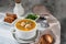 meatball soup. white broth on a wooden stand with delicious noodle soup with meatballs