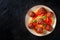 Meatballs with pasta, shot from above on a dark background