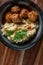 Meatballs pork and mashed potatoein paprika gravy served with groats bulgur