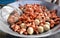 Meatballs and Sausages Frying in a large pan