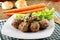 Meatballs stewed with vegetables