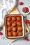 Meatballs in Tomato Sauce, Homemade Meatballs in a Baking Dish on Bright Concrete Background