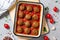 Meatballs in Tomato Sauce, Homemade Meatballs in a Baking Dish on Bright Concrete Background