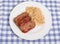 Meatloaf and Brown Rice on White Plate