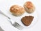 Meatloaf with fork and bread on plate