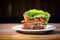 meatloaf sandwich on rustic bread with lettuce