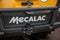 Mecalac logo brand and text sign wheeled backhoe yellow excavator loader machine in