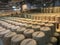 MECCA, SAUDI ARABIA - JUNE 1, 2019 :  Workers rest among hundreds of zamzam water drums inside  Haram Mosque in Mecca, Saudi