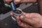 A mechanic applies blue grease on top of the bearing of the bottom bracket of mountain bike. Maintenance service at a bicycle