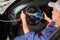 Mechanic diagnosis of the steering in auto repair service