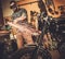 Mechanic doing lathe work in motorcycle customs garage