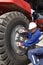 Mechanic fixing giant truck tire