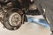 Mechanic Hands Replace Brake Pads on Car