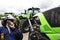 Mechanic and large farming tractors