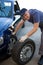 Mechanic repairman making tyre in workshop