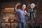 Mechanic or rider giving a thumbs up in a workshop