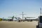 Mechanic serves two engine-propeller aircraft at Heraklion Airport