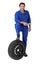 Mechanic with a spare tyre