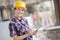 mechanical engineer taking notes at metallurgy factory