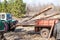 Mechanical loading and transportation of pine wood using a tractor