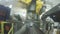 Mechanical Robot Arm Puts Meter Detail on Conveyor Closeup