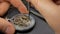 Mechanical watch repair. Watchmaker assembles a watch