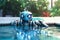 Mechanical waterproof robot in pool. Modern cybernetic machine with artificial intelligence swimming in swimming pool