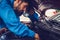 Mechanics checking and repairing the car. Car auto services concepts