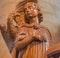 Mechelen - Modern carved statue the Inspiration of Saint John the Evangelist by Ferdinand Wijnants in st. Johns church