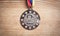 Medal awards for winner on wooden background