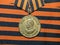 Medal `of Victory in the great Patriotic war 1941-1945` on the background of the St.George`s ribbon. Awards of the soldier.