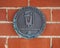 Medallion on The Historic Anderson Building in Dalworth Park in Grand Prairie, Texas.