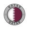 A medallion with the name of the country Qatar and the circular