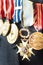 Medals for bravery. Cropped shot of war medals on a soliders suit.