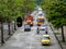 MEDELLIN, COLOMBIA - Dec 03, 2020: Street with Full Traffic, with Trees on the Edges