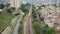 Medellin public transport metro train passing underneath a drone