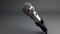 a media journalist& x27;s microphone on a light background with ample empty space on the left for text or graphics. The