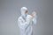 Medic in white hazmat protective suit, coronavirus illustration concept